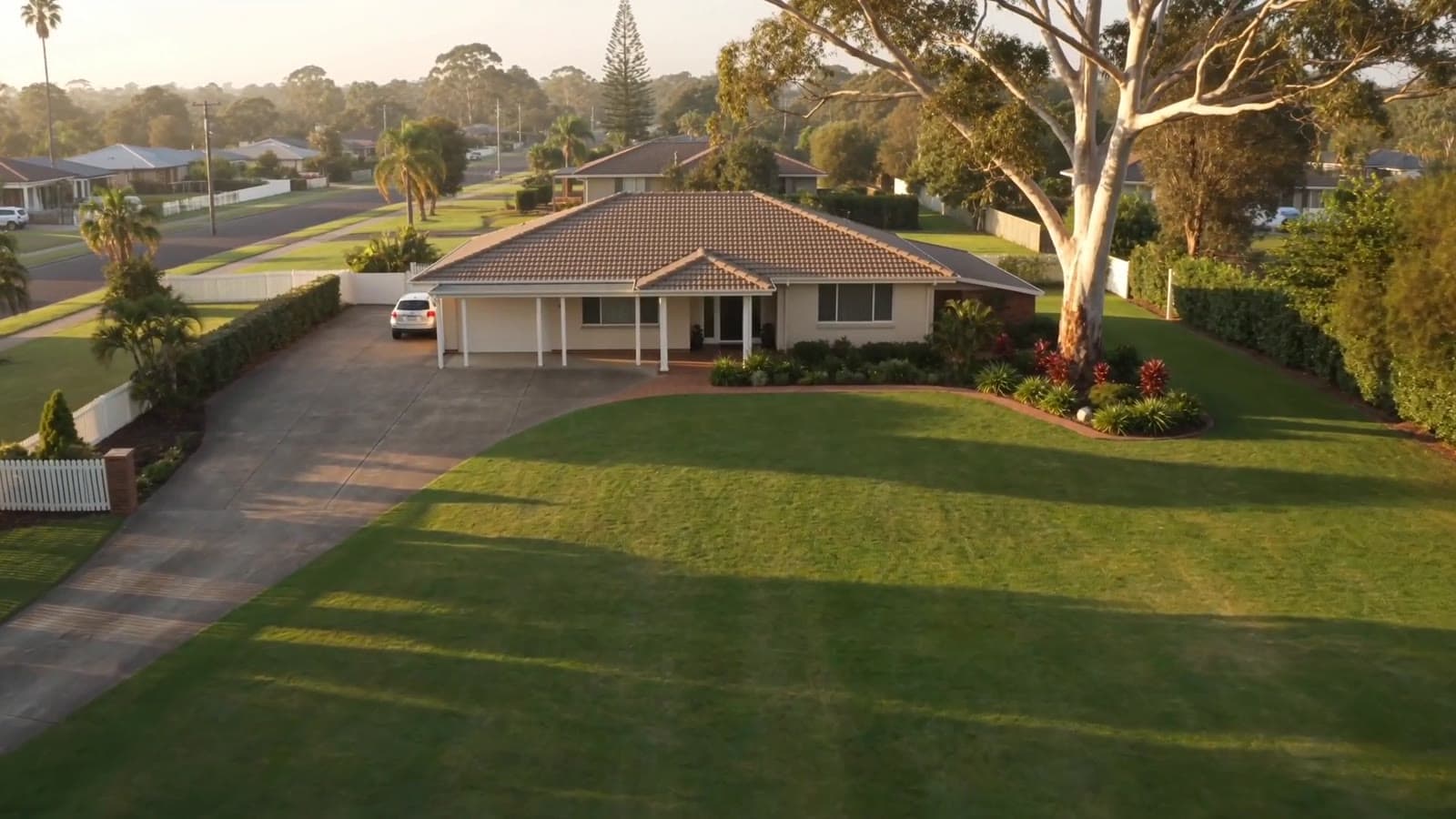 Aerial view of a large subdividable suburban block at golden hour